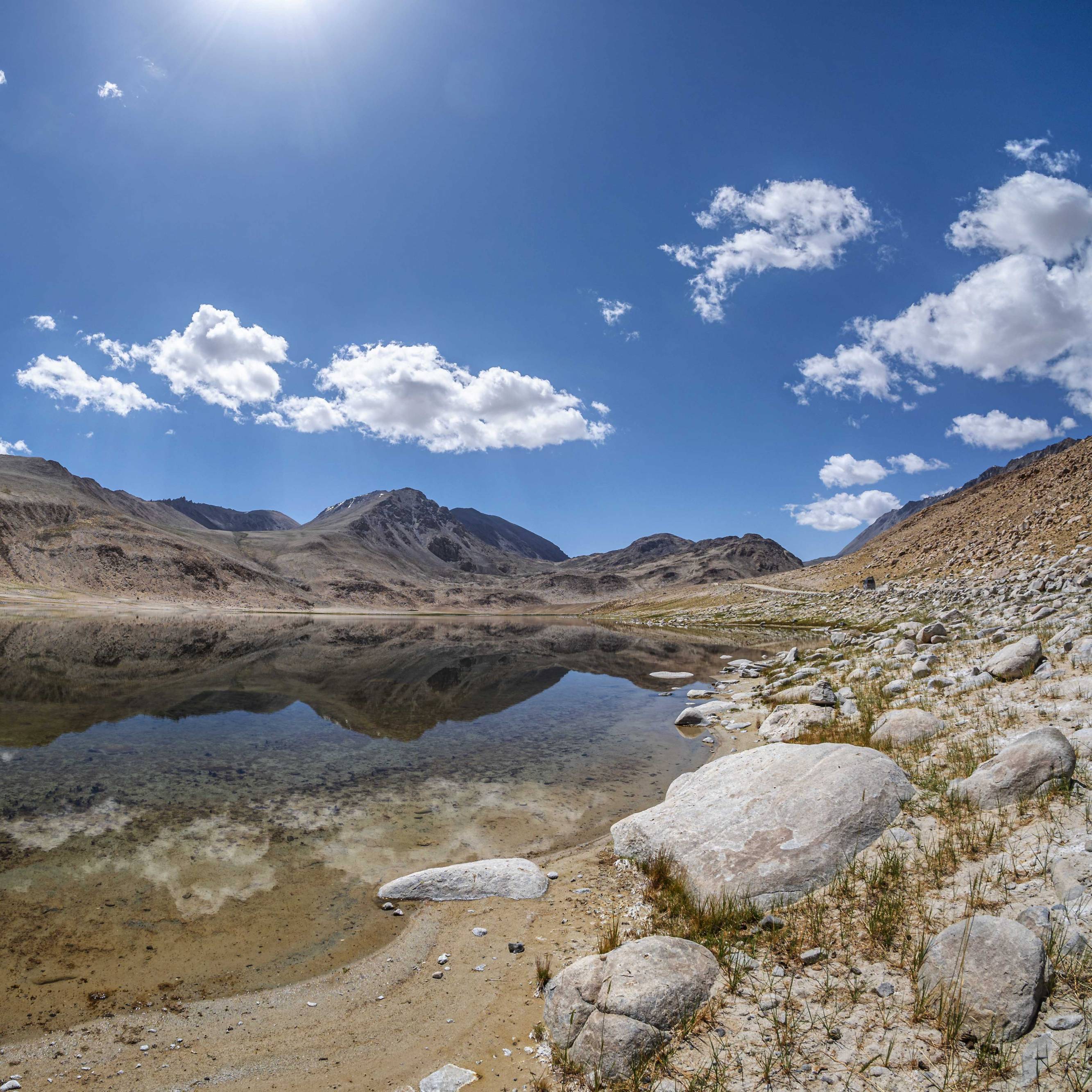 Crystal clear mountain lake along the way