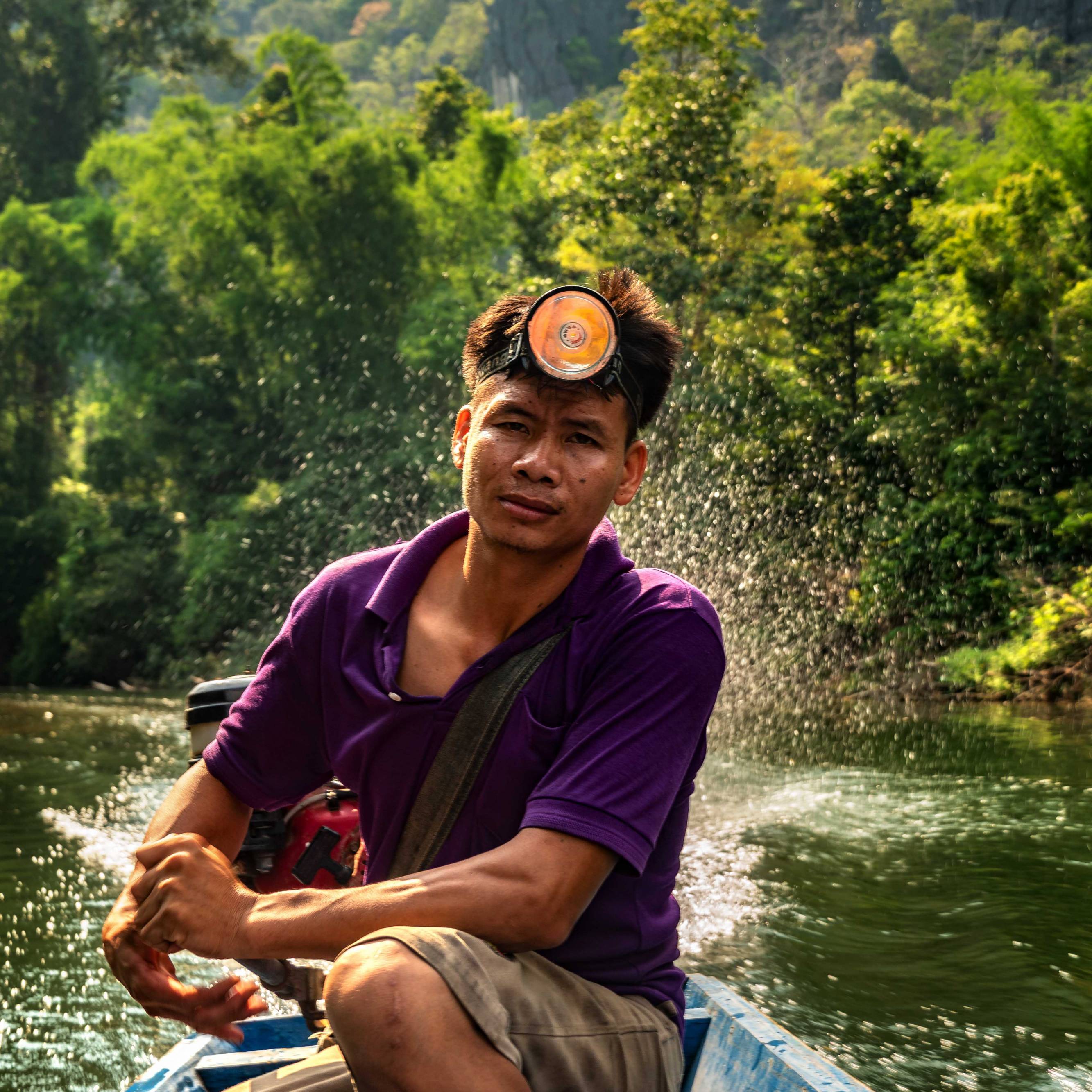A LOCAL BOATMAN AT PHOU HIN POUN NATIONAL PARK