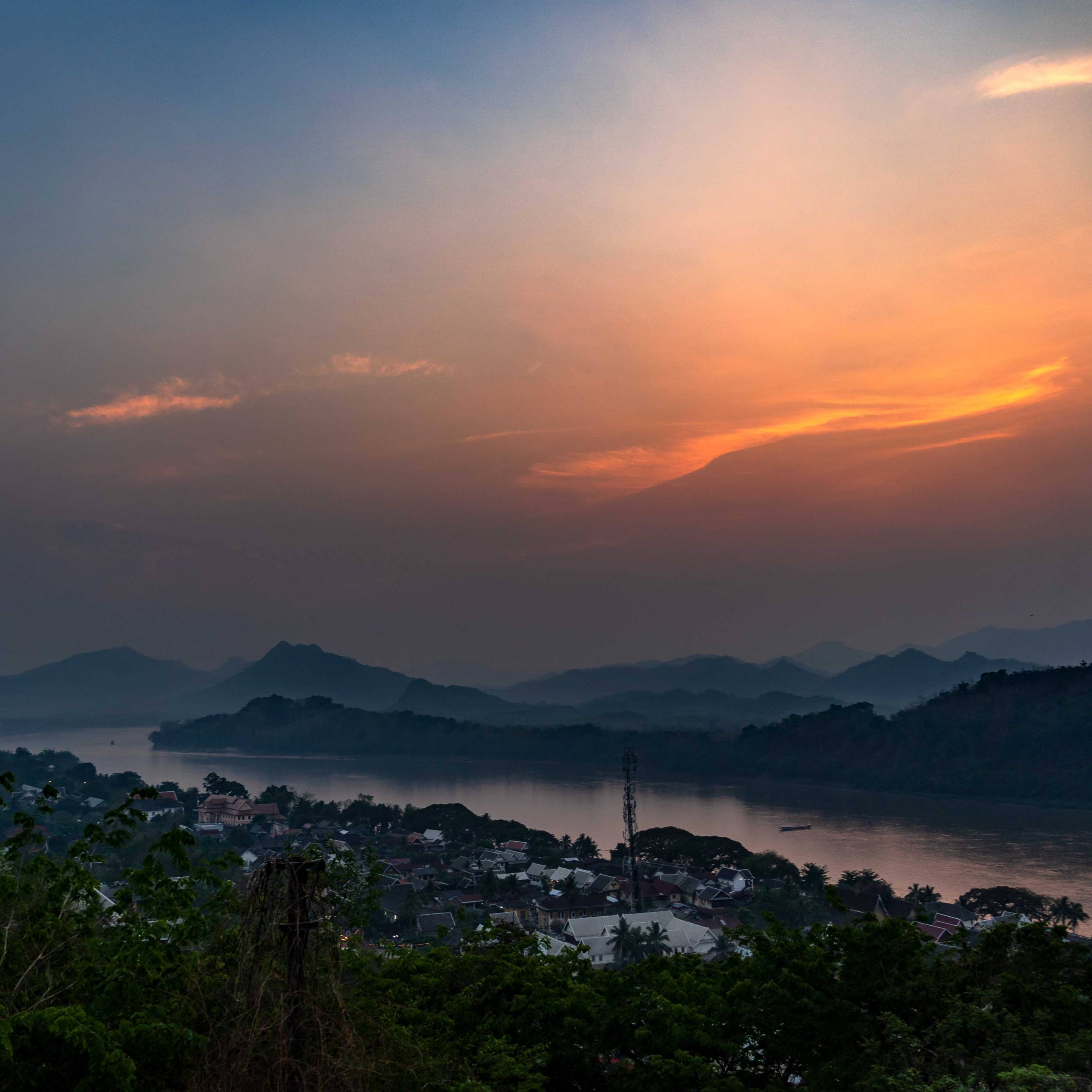 SUNSET AT TEMPLE IN LUANG PRABANG