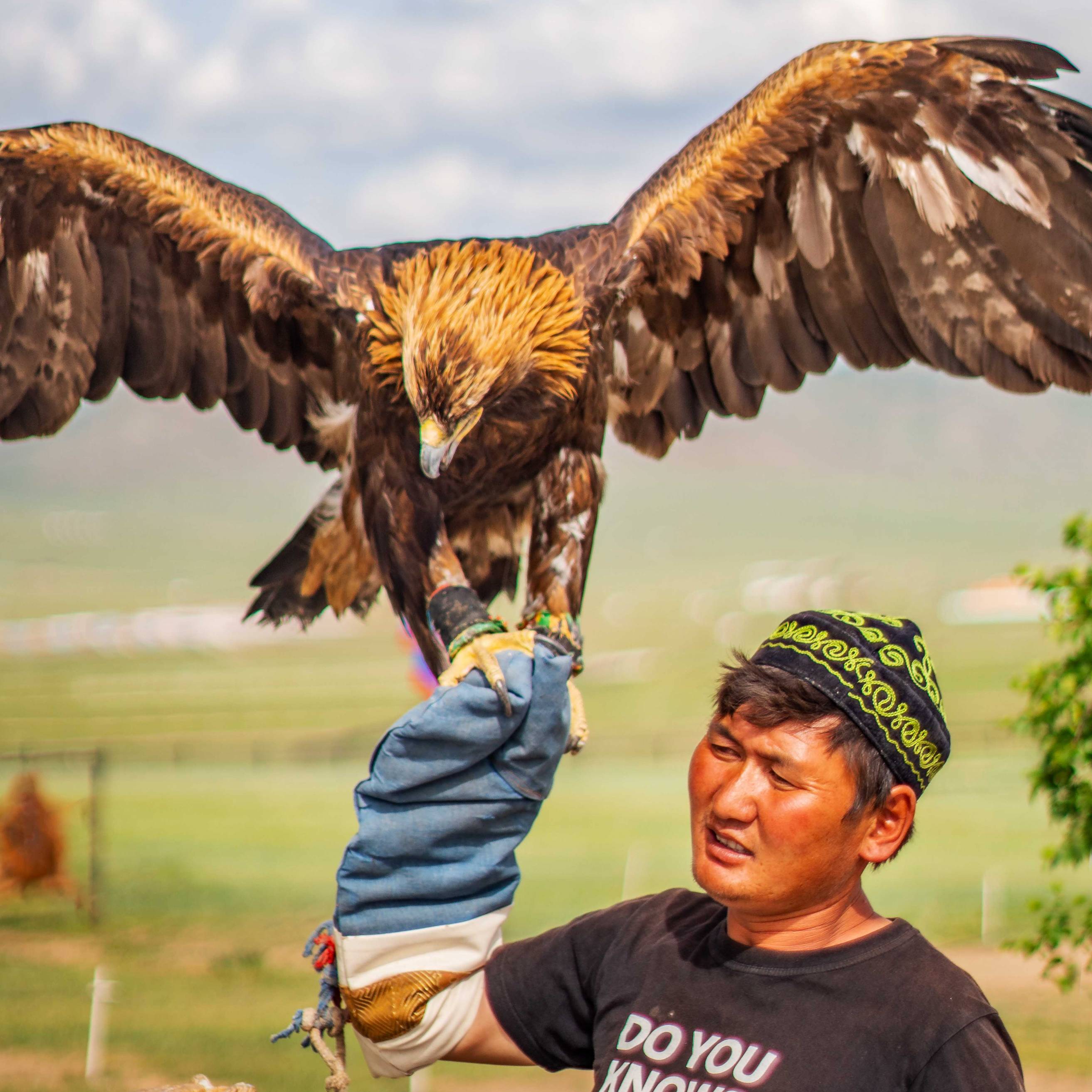 Local with Eagle at Dschingis Khan Statue