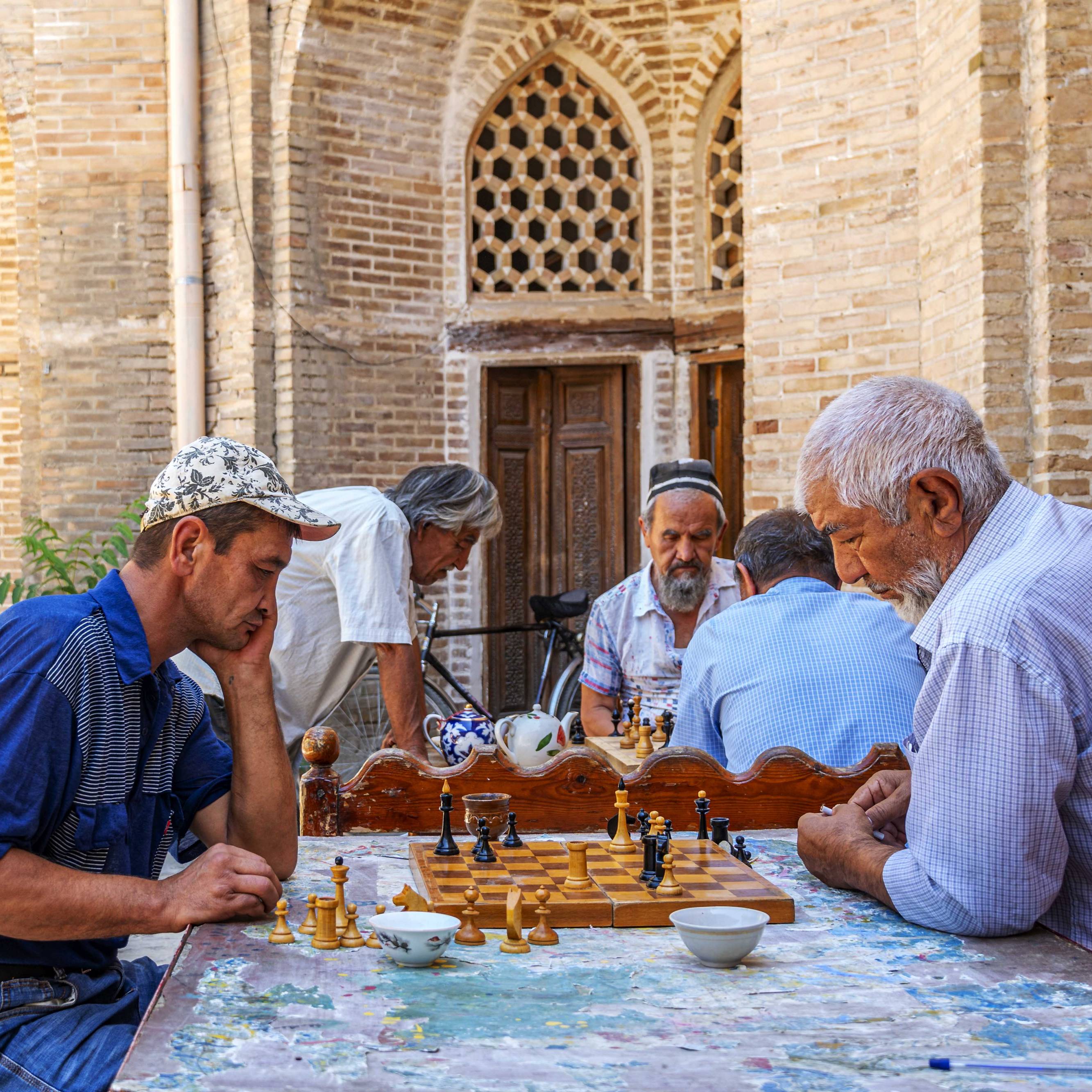 Men playing chess in Buchara