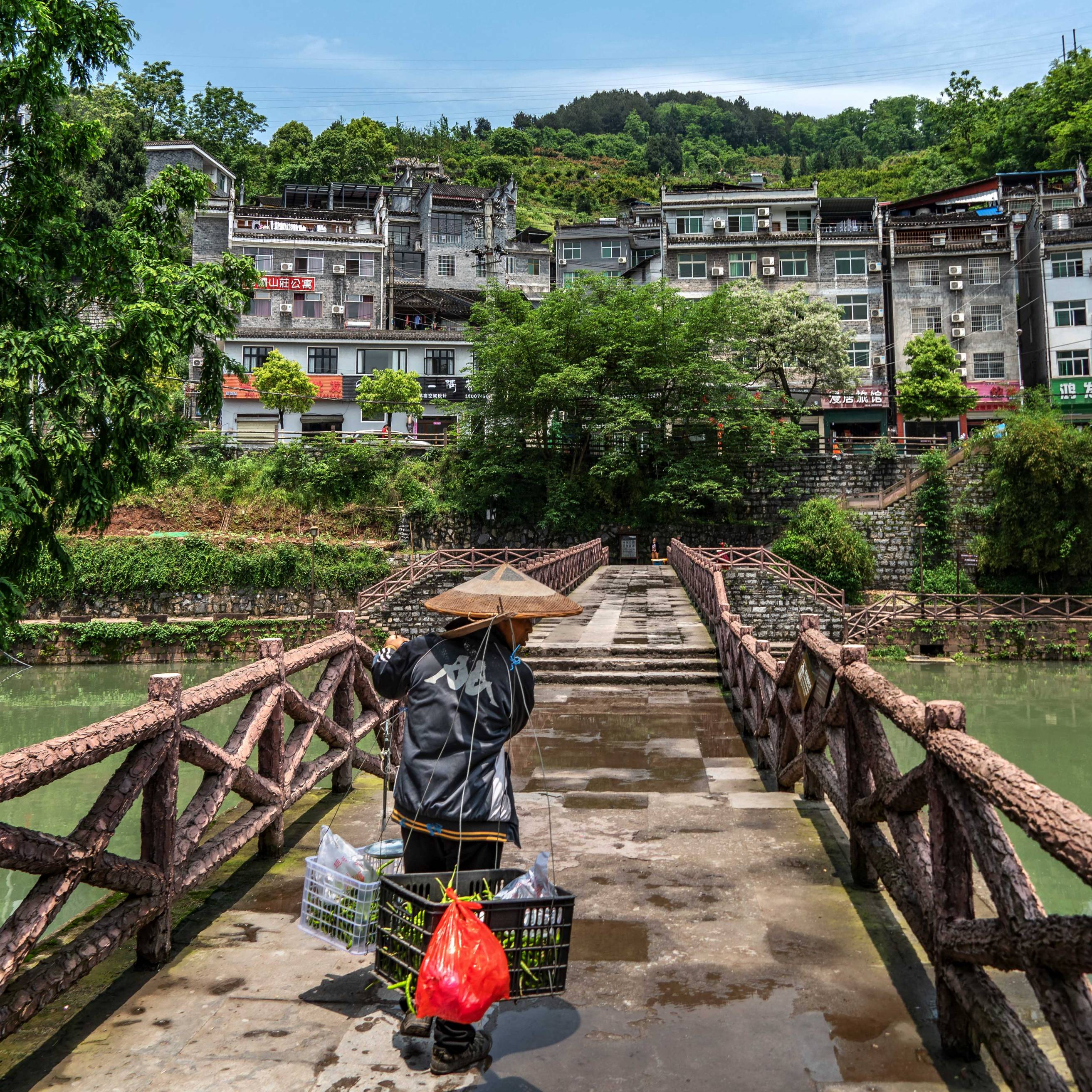 Chinese Man Selling Vegetables in Fenghuang